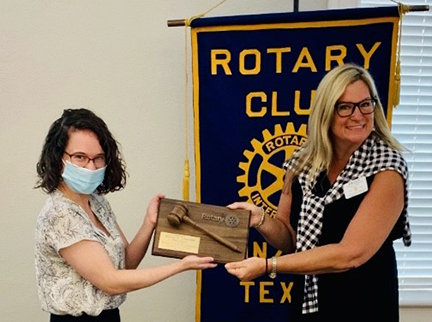 Past Rotary President Kelly A. Lindner, right, and new President Dr. Caitlin Walker.